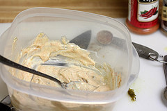 Creamy quesadilla sauce mixed in container