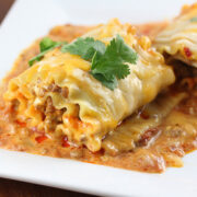 Taco lasagna roll up topped with melted cheese