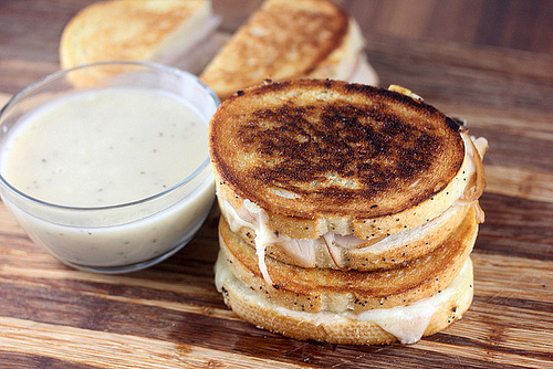 Stacked turkey grilled cheese with dipping gravy