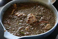 Jerk marinade simmering in white skillet