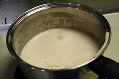 Cream sauce simmering in saucepan