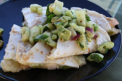 Stacked chicken quesadillas with fresh avocado salsa