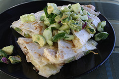 Close up of chicken quesadillas with avocado topping