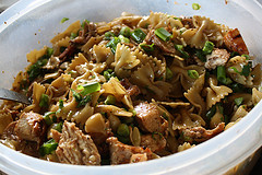 Grilled chicken and bowtie pasta salad with green onions