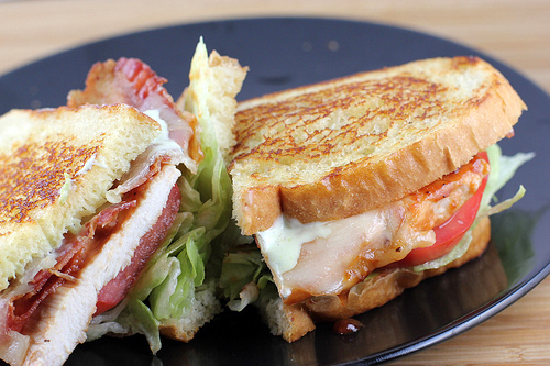 BBQ chicken sandwich with lettuce and tomato