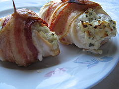 Bacon wrapped chicken on plate