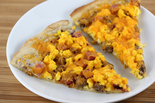 Breakfast pizza with ham and cheese