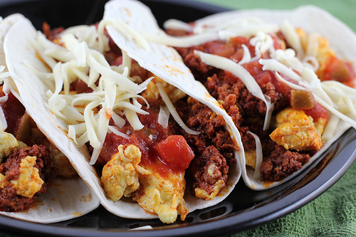 Breakfast tacos filled with eggs and meat