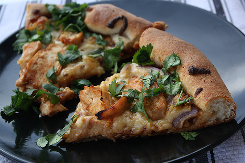 Close up california chicken pizza slice