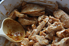 Chicken pieces coated in barbecue sauce