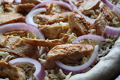 Close up california chicken pizza toppings