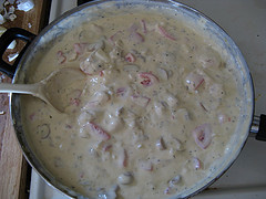 Creamy chicken alfredo sauce in skillet