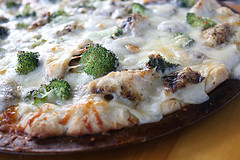 Chicken alfredo pizza with broccoli