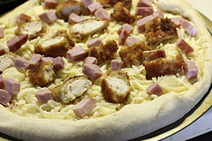 Chicken cordon bleu pizza before baking