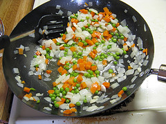 Diced vegetables cooking for fried rice