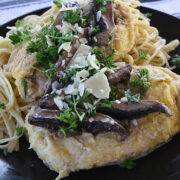 Close up chicken scallopini with spaghetti