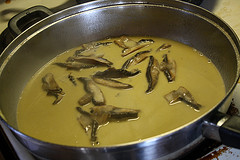 Mushroom sauce simmering in pan