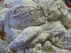 Chicken strips coated in flour