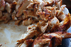 Spiced chicken grilling for fajita pizza