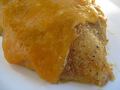 Baked chicken with melted cheddar cheese