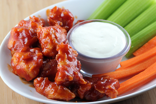 BBQ chicken bites with celery and carrots