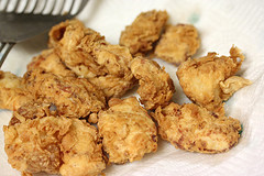 Fried chicken pieces on paper towel