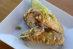 Crispy lime chicken wings on plat