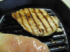 Chicken breast grilling with sauce