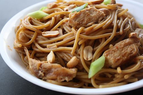 Chicken peanut noodles with scallions