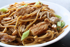 Chicken peanut noodles with chopped peanuts