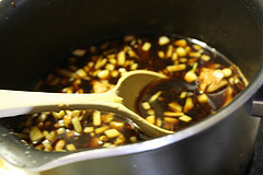 Peanut sauce with garlic in saucepan