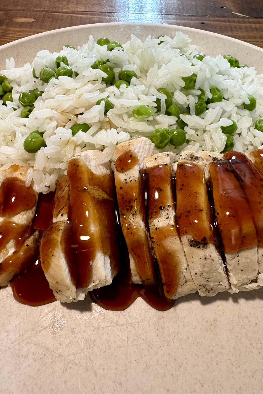chicken teriyaki with rice and peas